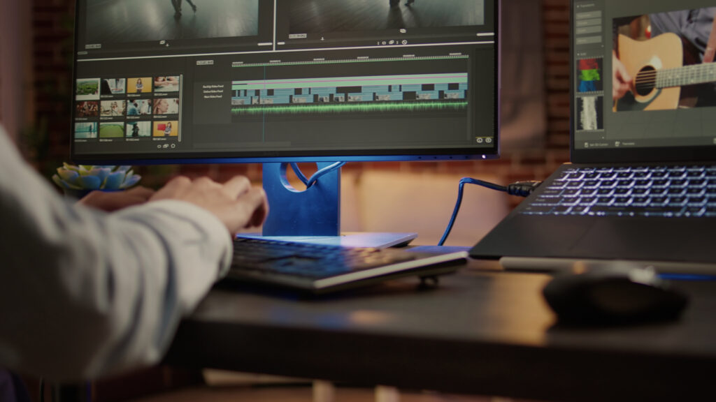 multimedia artist editing movie footage on post production software using visual effec sbi 349550971